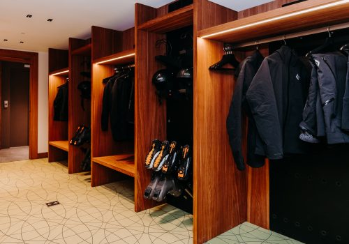Sleek boot room with organised gear