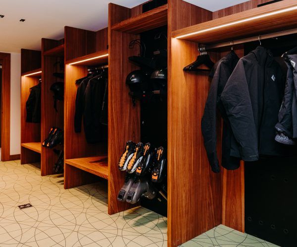 Sleek boot room with organised gear